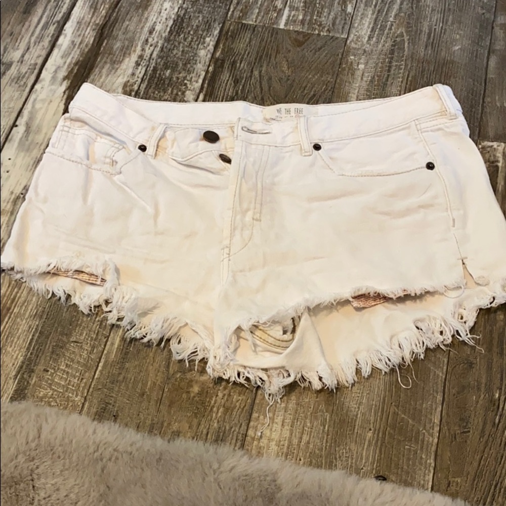 Free people White distressed denim shorts